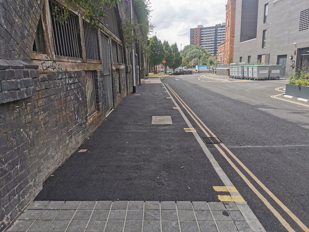 Gore Street showing road markings, including double yellow lines and tarmac on pavements